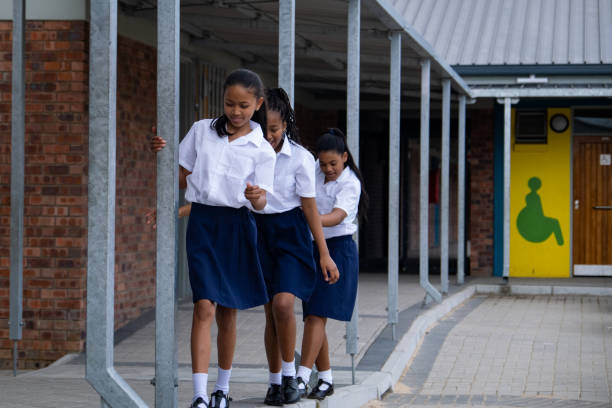 istock Group of schoolgirls in school uniform 1785074927