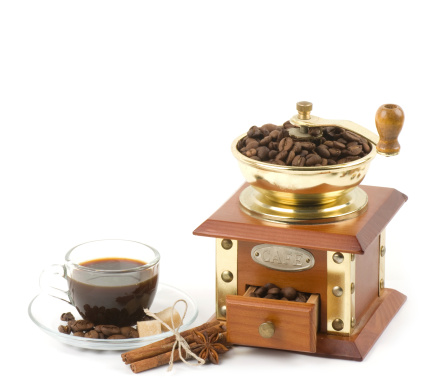 Coffee grinder and little cup