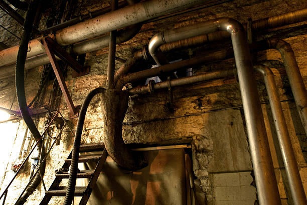 istock Old abandoned dirty empty scary factory interior 178508040