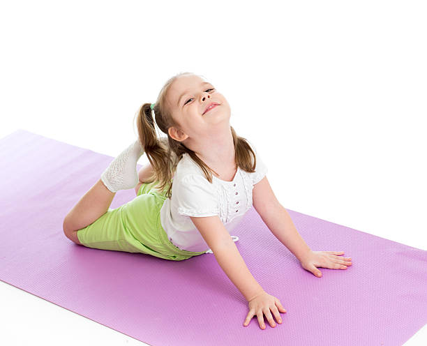 istock kid girl doing gymnastics 178508146