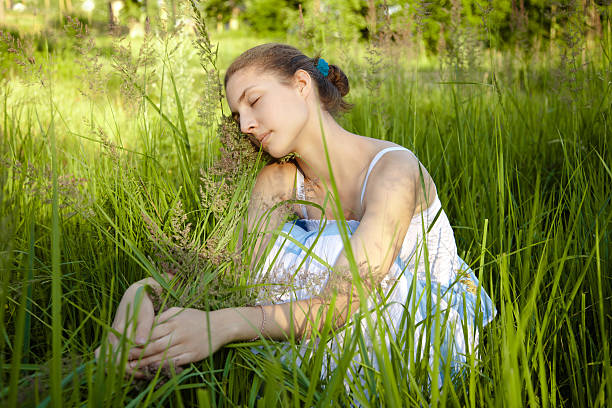 istock girl in the grass 178508290