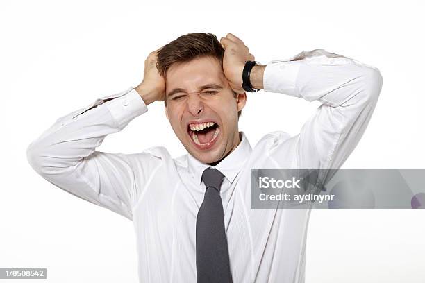 Stressed Out Businessman Holds Head Screaming Stock Photo - Download Image Now - People, Terrified, 20-29 Years