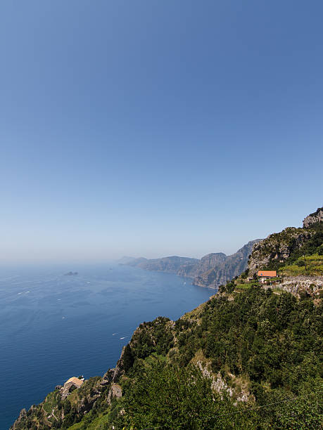 Houses on steep coastline stock photo