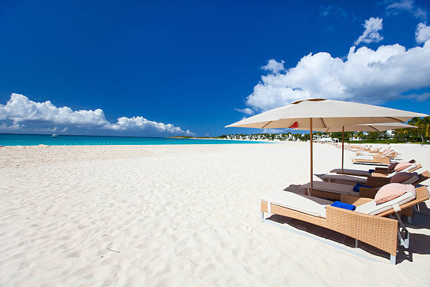 istock Chairs and umbrellas on tropical beach 178508665