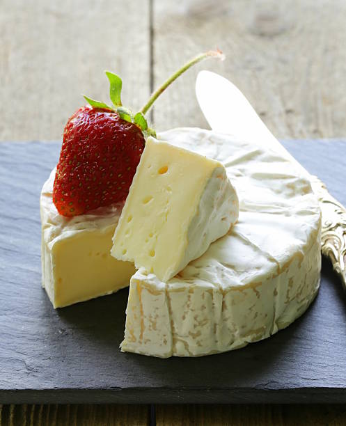 istock round piece of soft cheese with mold (brie, camembert) 178508727