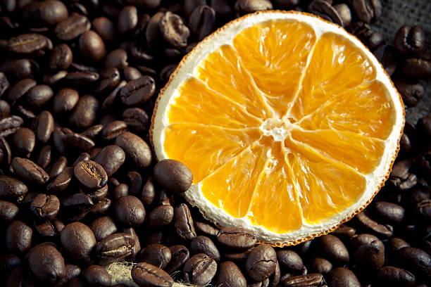 Coffee beans with orange stock photo