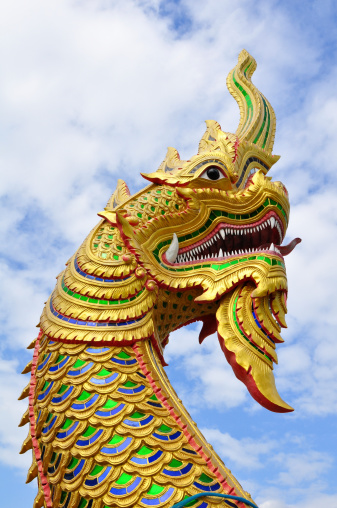 king of naga with blue sky at thai temple