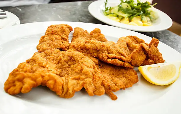 Traditional Wiener schnitzel, classic speciality of the Viennese cuisine, Vienna, Austria