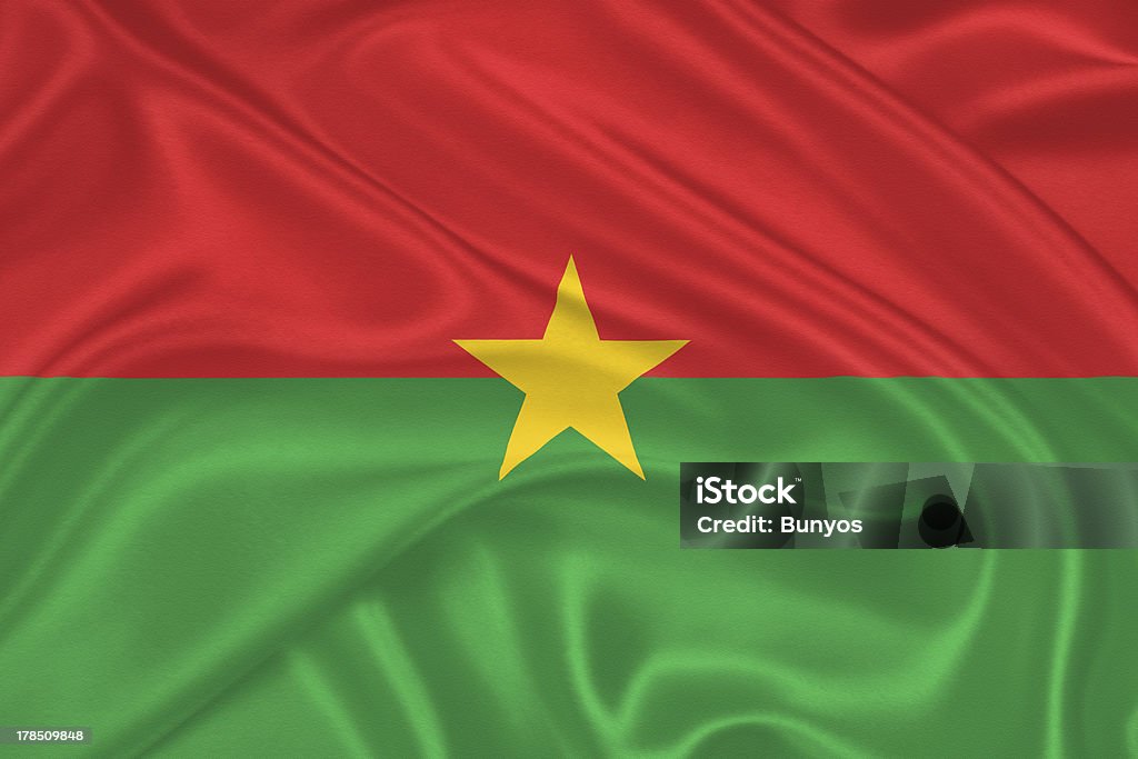 Flag of Burkina Faso Flag of Burkina Faso waving with highly detailed textile texture pattern Africa Stock Photo