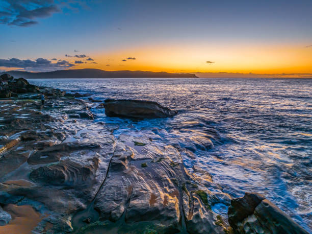istock Aerial sunrise views over the ocean and beach 1785099861