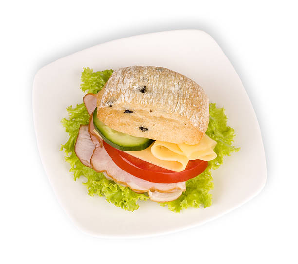 sandwich on white plate stock photo