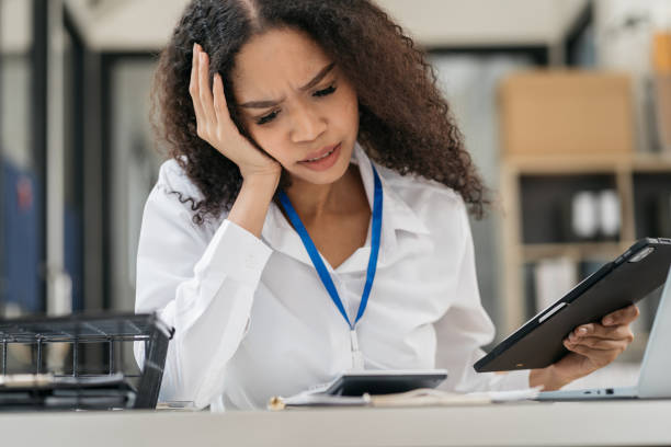 istock Stress businesswoman is sitting at table, under stress from working. 1785105587