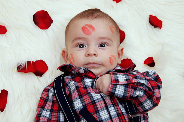 istock Cute baby boy with lipstick on his face 178510580