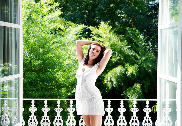 istock Beautiful young woman in white 178511127