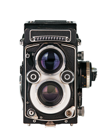 Twin lens reflex photo camera on white