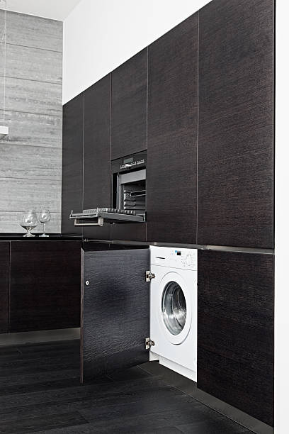 istock Build-in washing machine and cooker on modern black kitchen 178511982