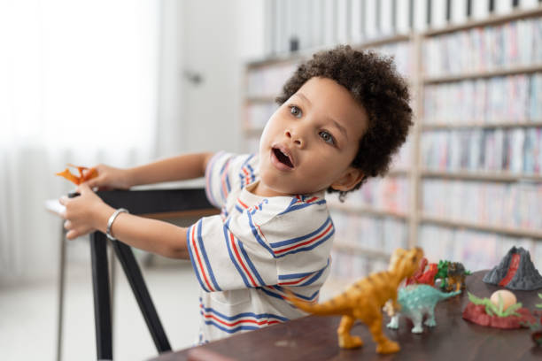 istock Portrait Student African American kid boy in classroom 1785123317