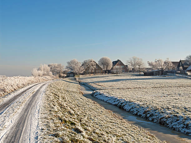 istock Dutch farm in winter landscape 178512346