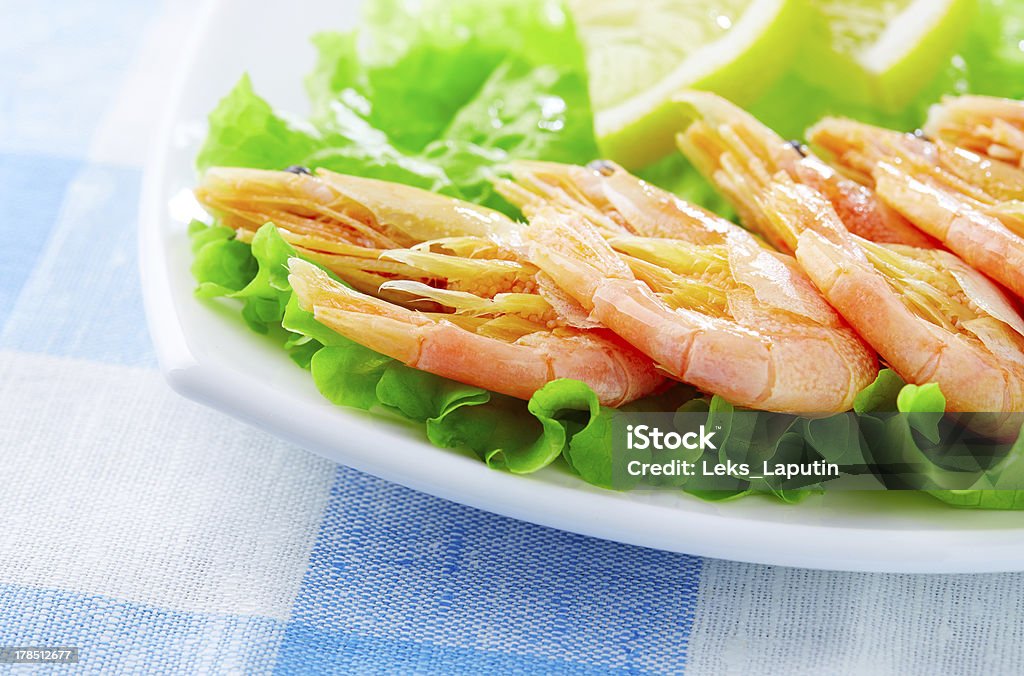 Shrimps Shrimps and salad on a plate Appetizer Stock Photo