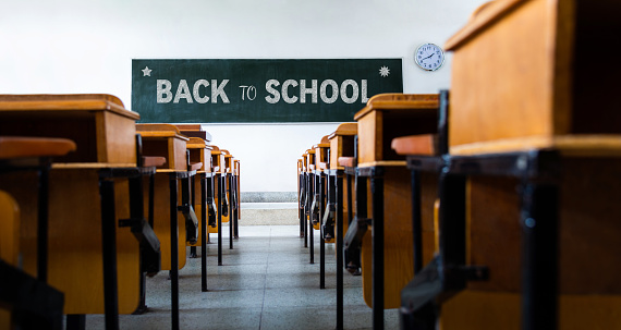 Back to school text on chalkboard