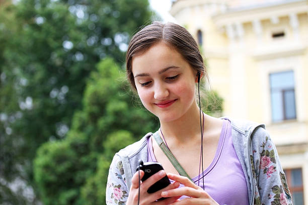 istock Girl with mobile phone 178512860