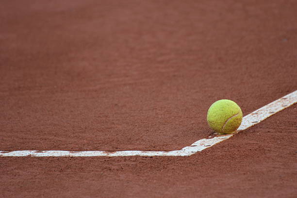 istock Tennis ball on the line 178513435