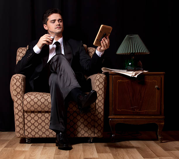 istock Man with alcohol sitting in vintage armchair 178513545