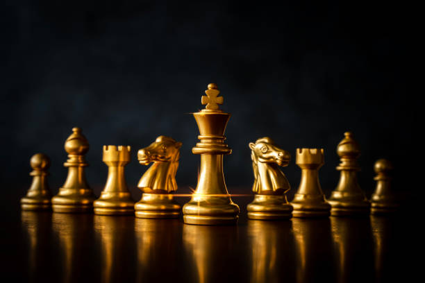 istock Business strategy brainstorming chess board game with black background, free copy space for your text. 1785136638
