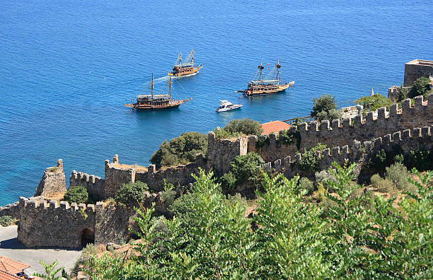 istock Alanya fortress wall and pirate's ships 178514253