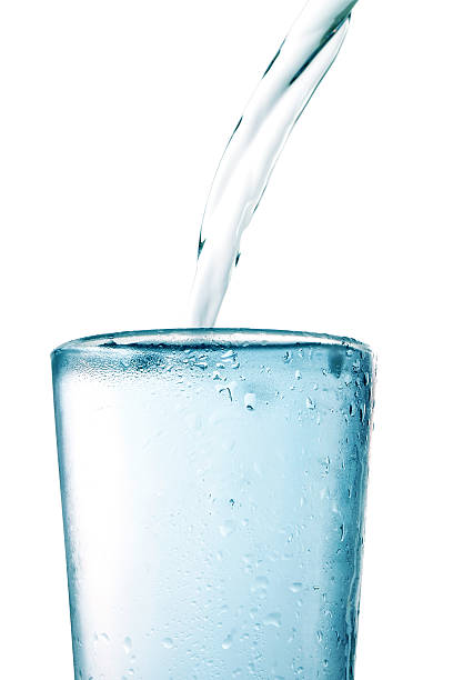 istock Cold water is poured into a glass. 178514307