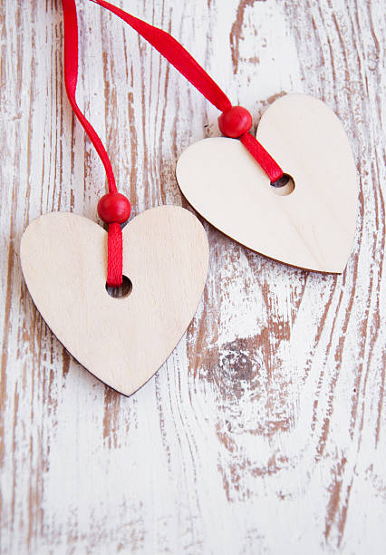 istock Hearts on wooden background 178515103