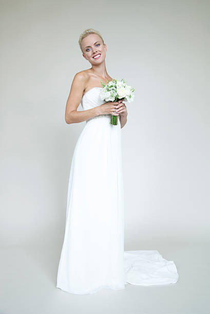 istock Beautiful young bride in white wedding dress 178515213