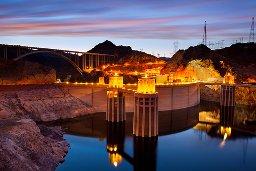 Image of Hoover Dam and bridge at twilight blue hour.