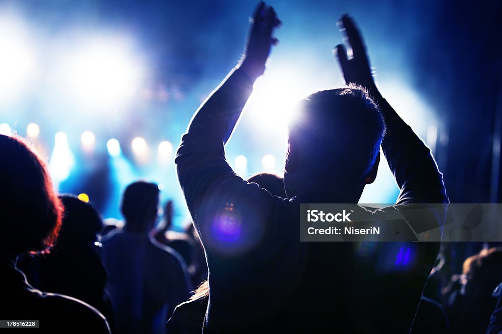 People on music concert Crowds of people having fun on a music concert Applauding Stock Photo