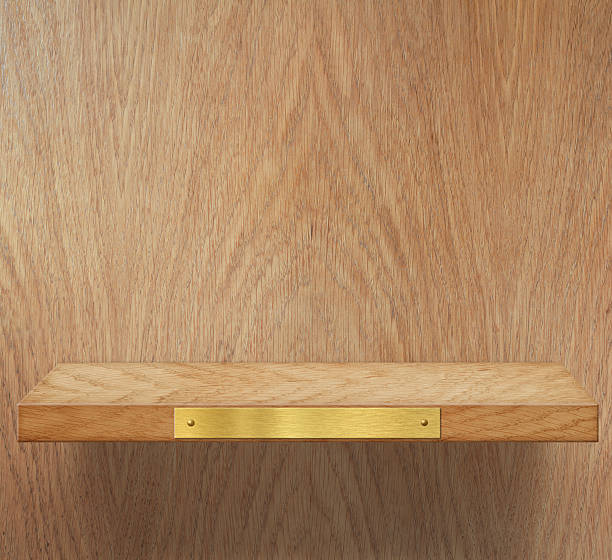 istock Empty wooden shelf with brass metal plate 178516752
