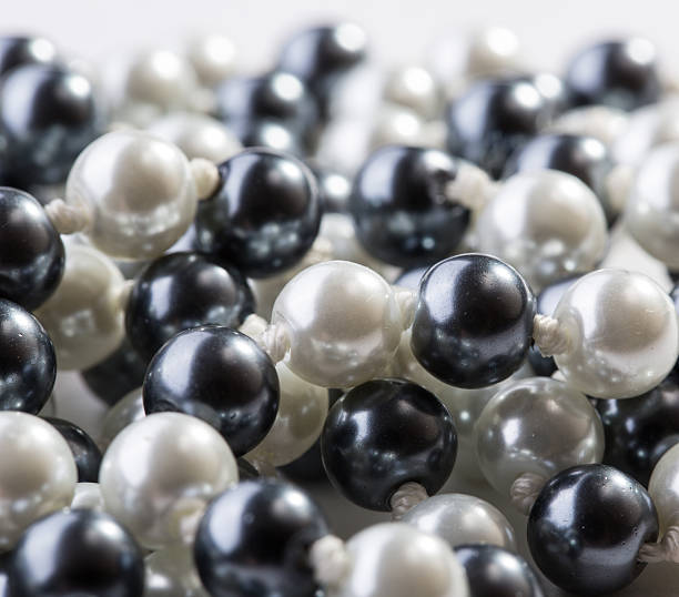 istock String of black and white pearls 178517333