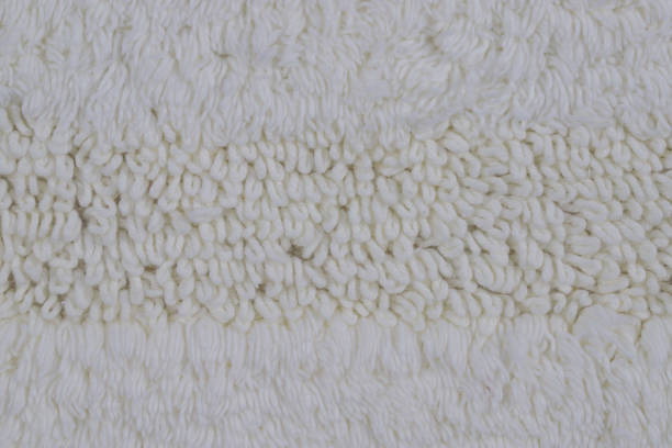 istock bath mat with pile and lace trim, hand-knitted, isolated on a white background 1785175217