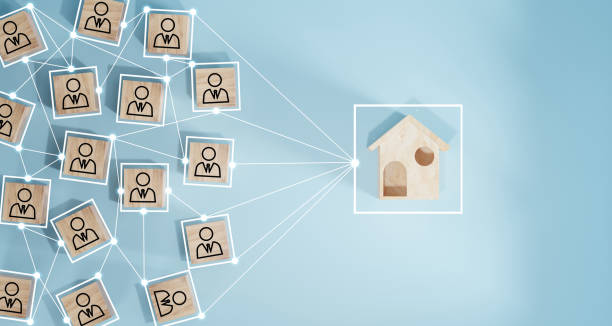 drewniany blok sześcienny ekran wydruku ikona osoby, która łączy sieć połączeń. celem jest dom. - stability finance housing development coin zdjęcia i obrazy z banku zdjęć