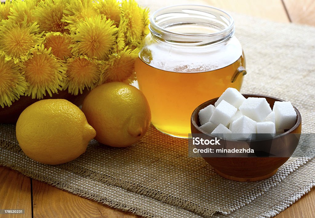 Jam of dandelions. Jam of dandelion (dandelion honey) and components for it`s preparation. Abstract Stock Photo
