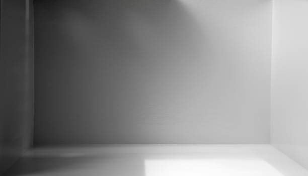 istock Light and shade in a gray room with empty space 1785203557