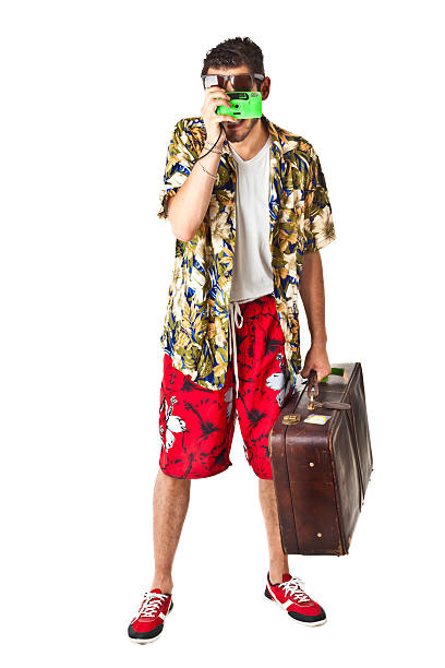 turysta z kamery - travel suitcase hawaiian shirt people traveling zdjęcia i obrazy z banku zdjęć