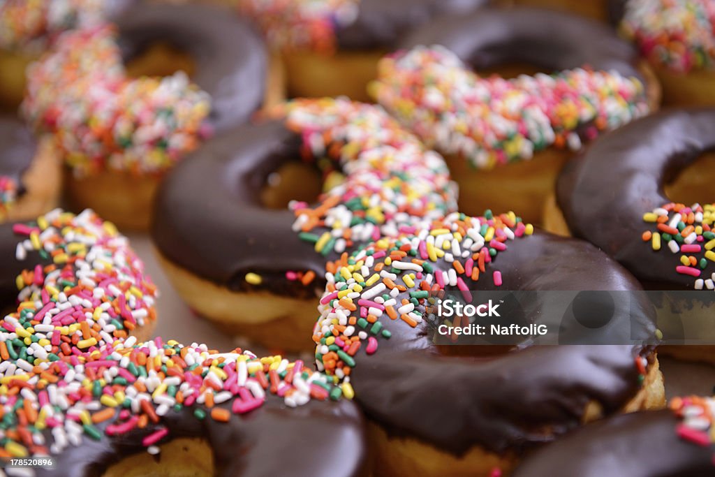 Delicious Donuts XXXL many Fresh Donuts waiting to be eaten! with selective focus Chocolate Doughnut Stock Photo