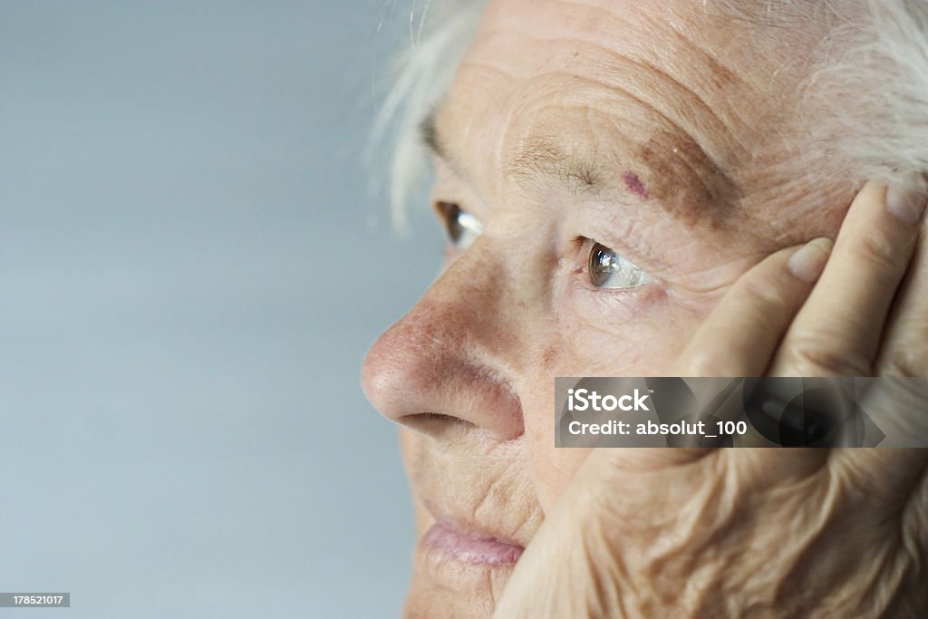 Memories of the senior woman Elderly woman brings back memories Adult Stock Photo