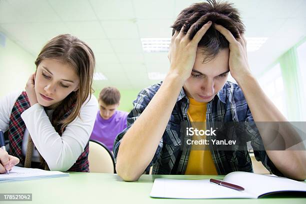 Students On Exam In Class Stock Photo - Download Image Now - Adult, Beautiful People, Beauty