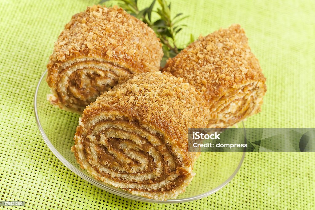 pastry roll filled pastry roll filled with condensed milk from biscuit dough Backgrounds Stock Photo