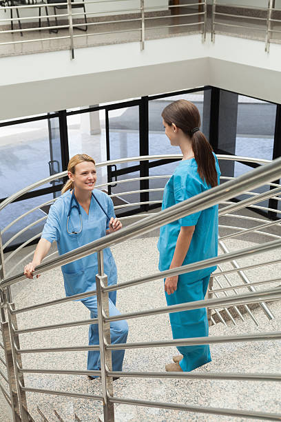 istock Two nurses standing opposite each other in the stairwell 178521308