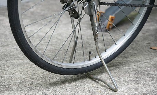 Bicycle rear wheel tires and stand placed in bicycle parking