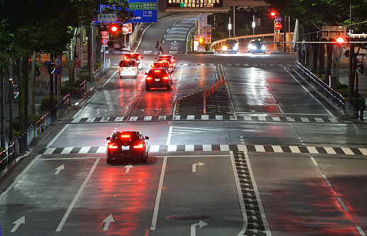 Night view of Japan road driving on the left side of a car