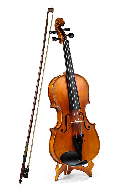 istock Violin and fiddle stick isolated on white 178522657