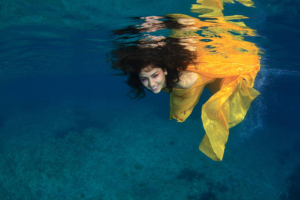 istock Young women underwater portrait 178522791